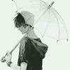 伞遮雨中人