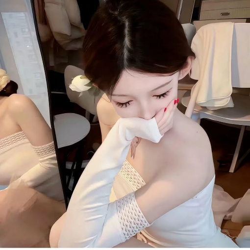 七七