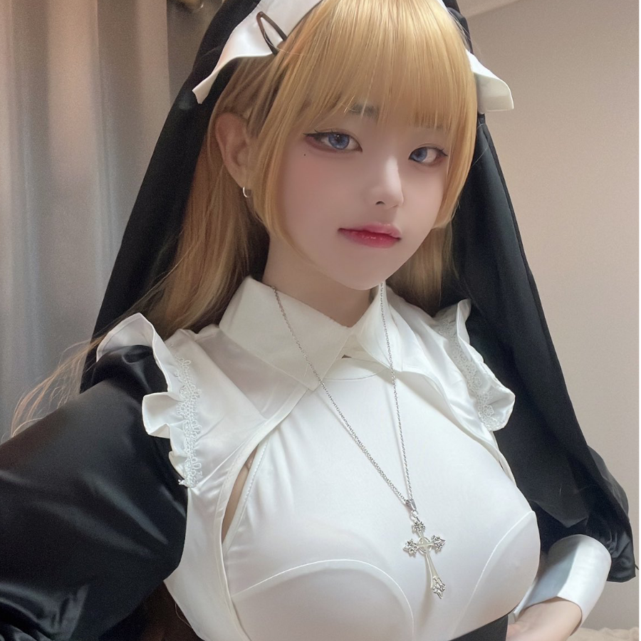 七七