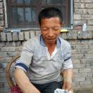 罗