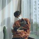 陌然亻